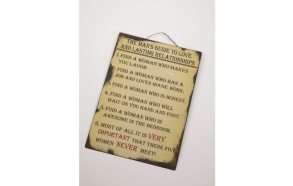 METAL SIGN A MANS GUIDE